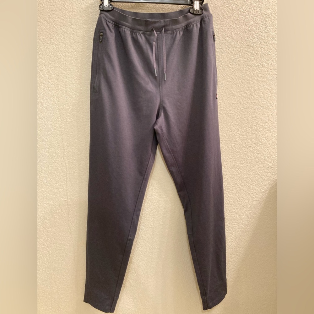 Champion grey athletic pants with zipper pockets and tie front